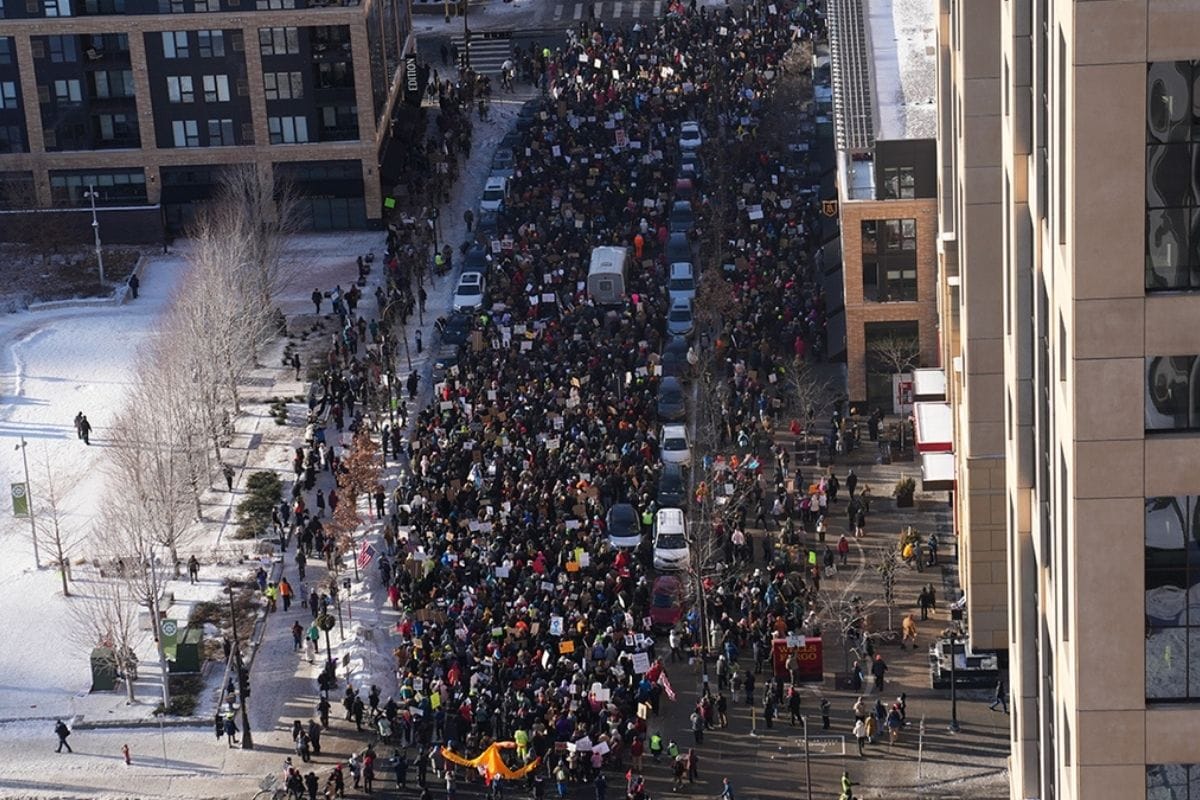 Minneapolis protesters march after fatal ICE shooting