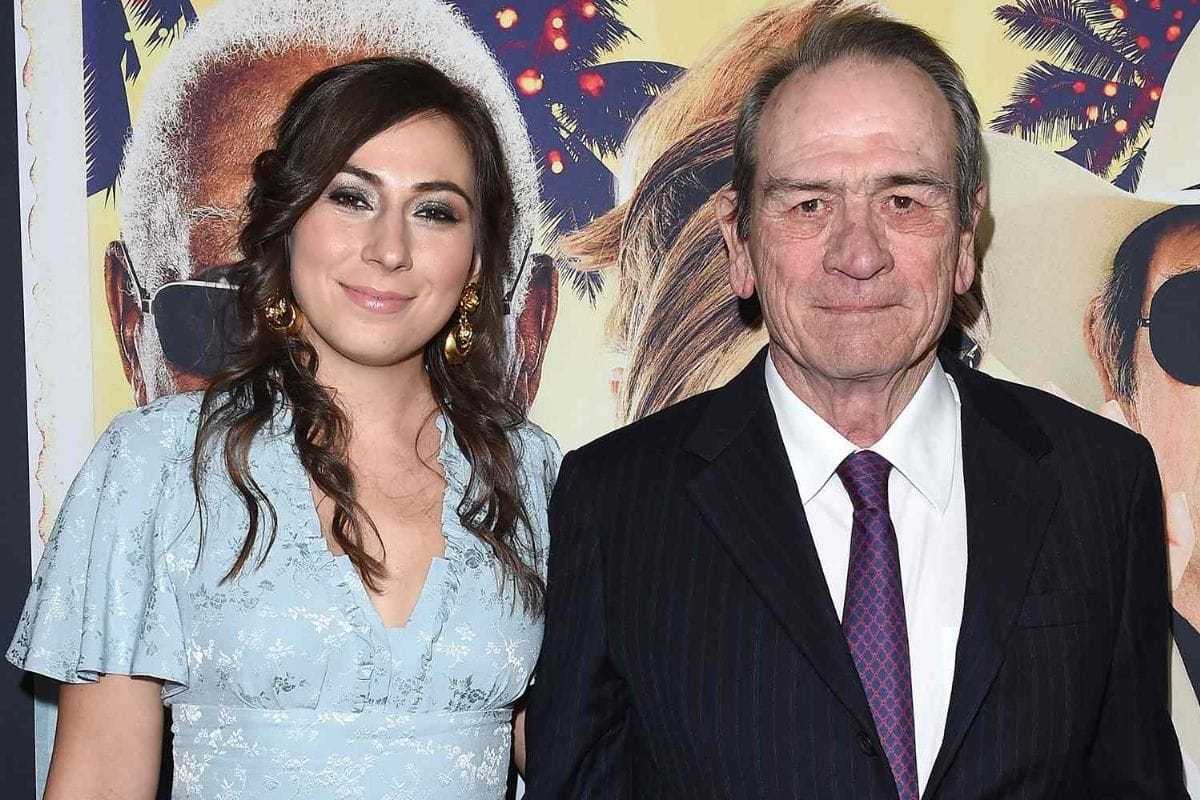 Victoria Jones poses with her father, actor Tommy Lee Jones, at a public event.